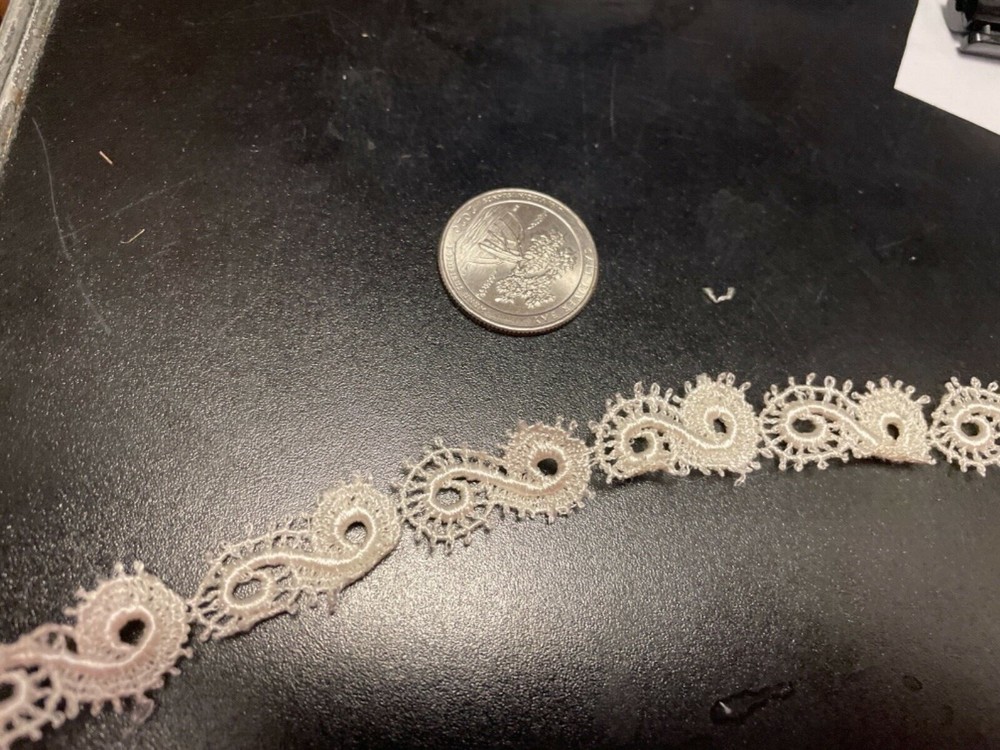 off white applique lace by the yard in delicate scrollwork pattern