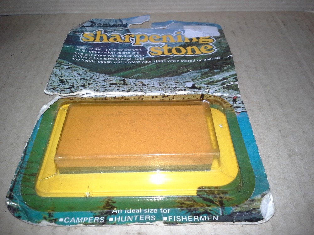 Coghlan's No.7945 Sharpening Stone w/Plastic Case. NOS-Damaged Packaging