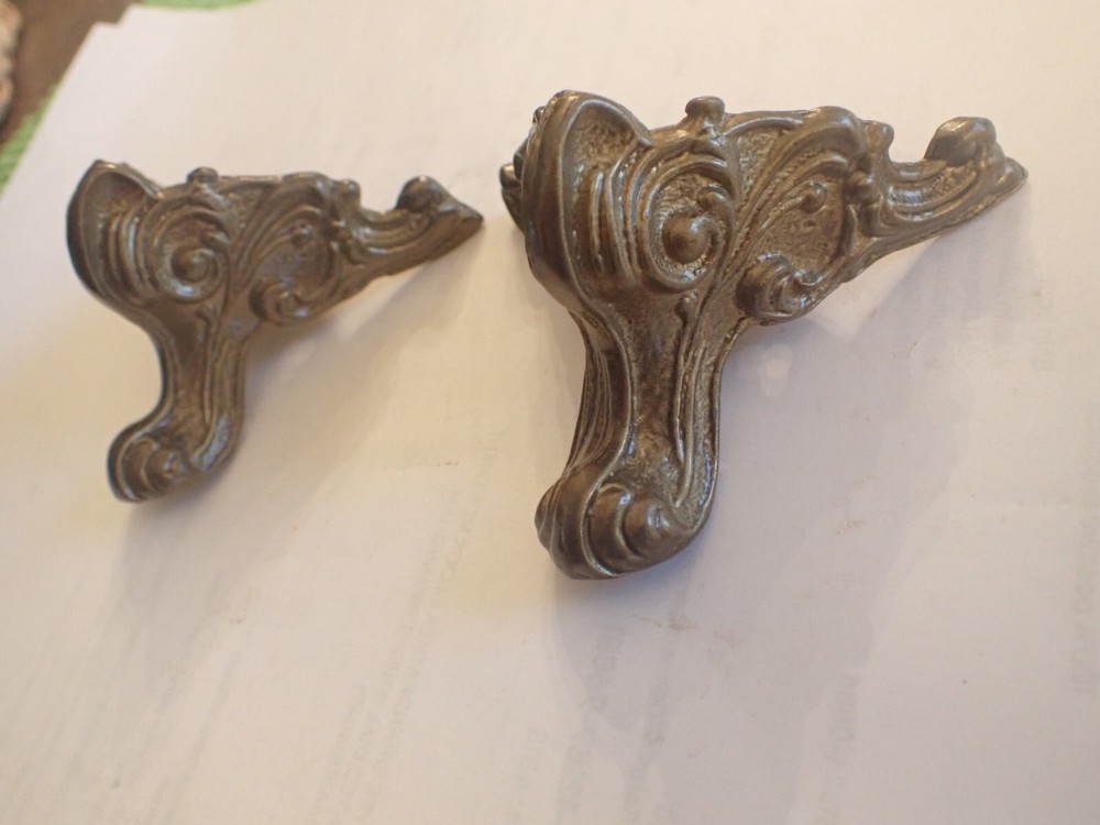 TWO FRONT FEET FOR BLACK MANTEL CLOCK