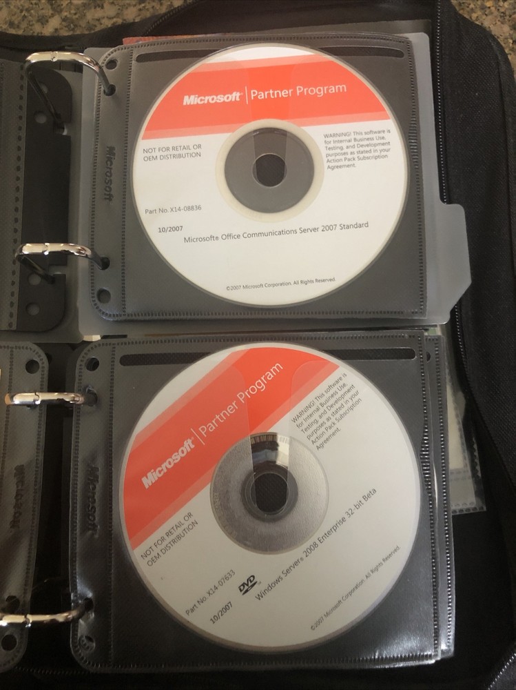 Microsoft Action Pack-Asst. Software 48 CDs- Many Keys Included