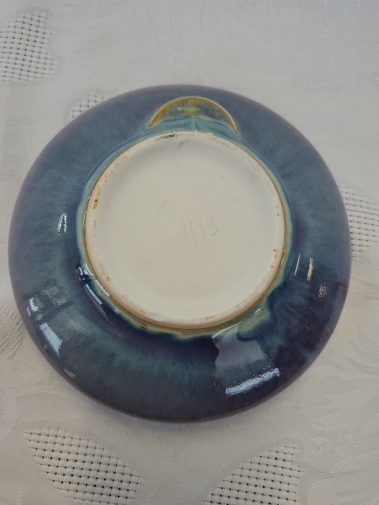 Ceramic single flower bud display vase.