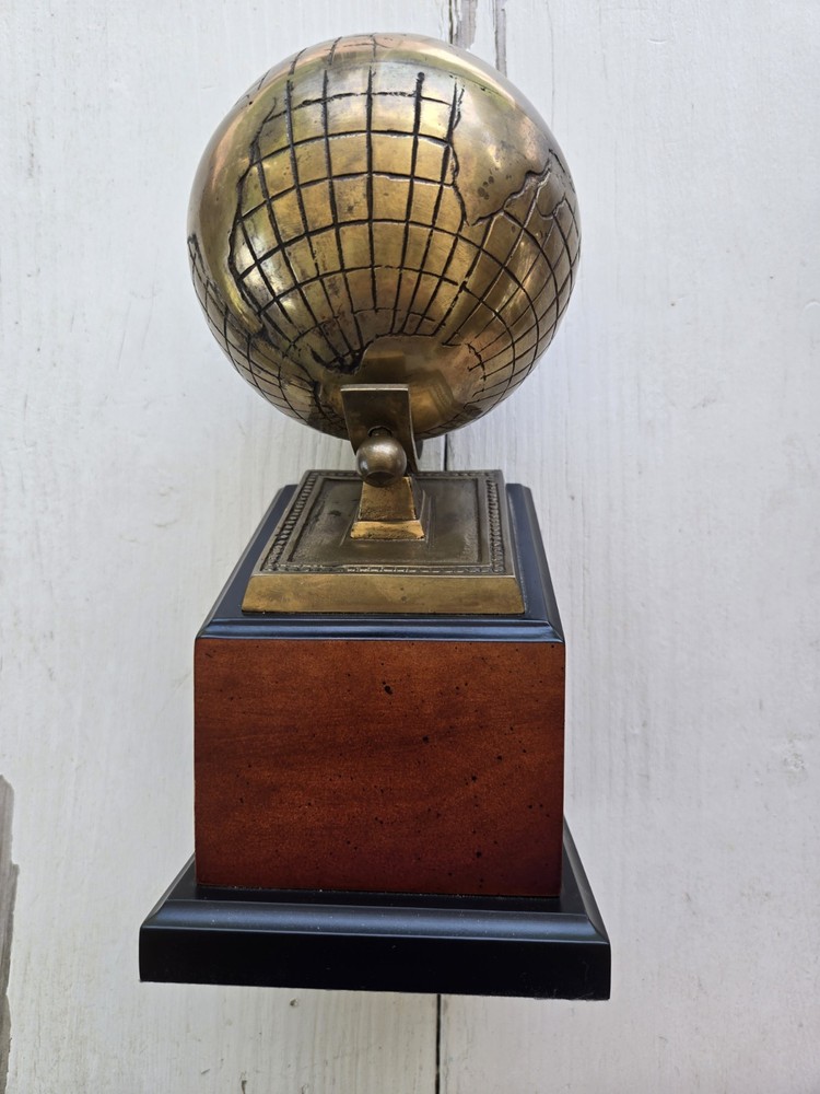 Brass Globe Bookend with wood base. One