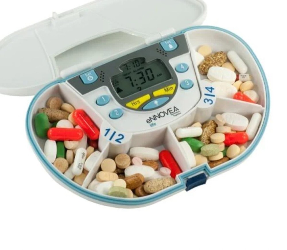 VitaCarry advanced pill case 4 Compartment With 4 Alarm Vibrating Timer