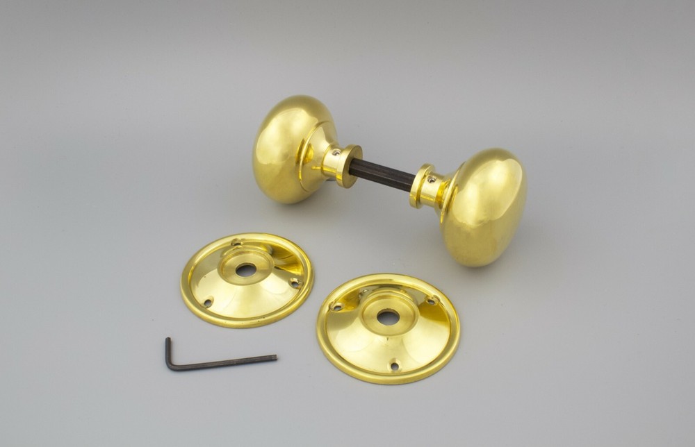 A pair of Solid Brass 65mm Unlaquered Victorian Brass Door Knobs Internal Handle
