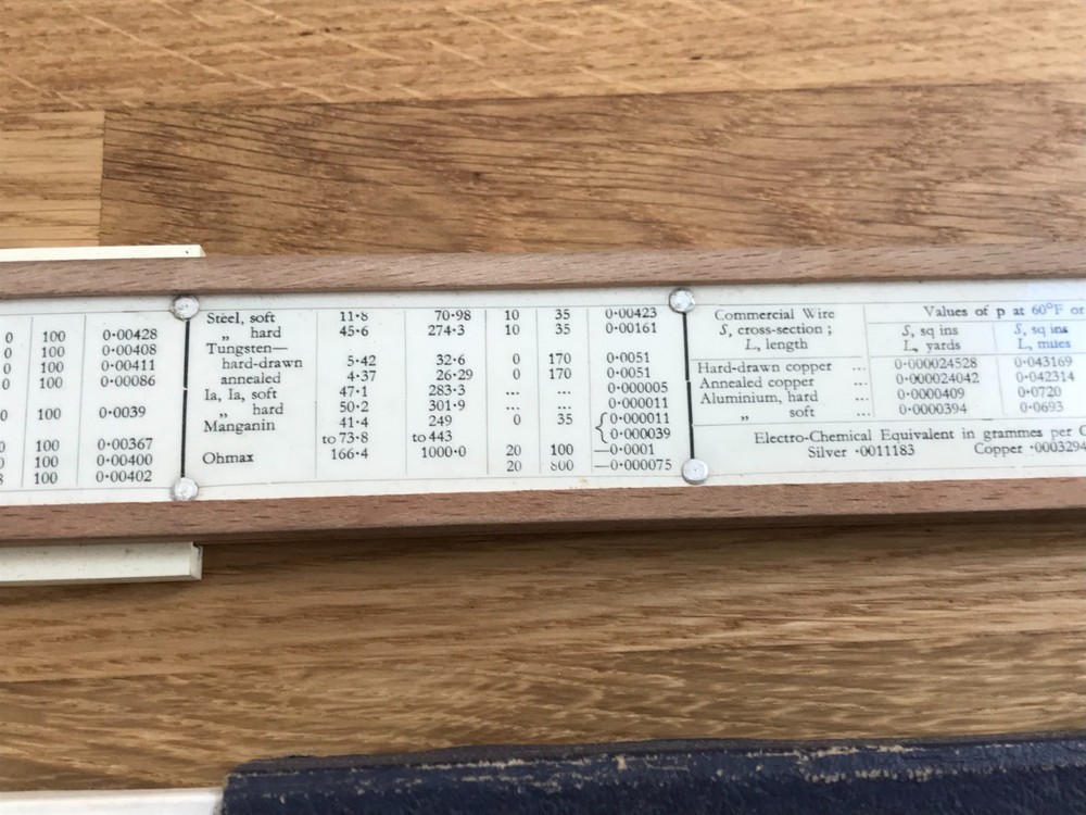 nice old good looking unique electrical slide rule in case