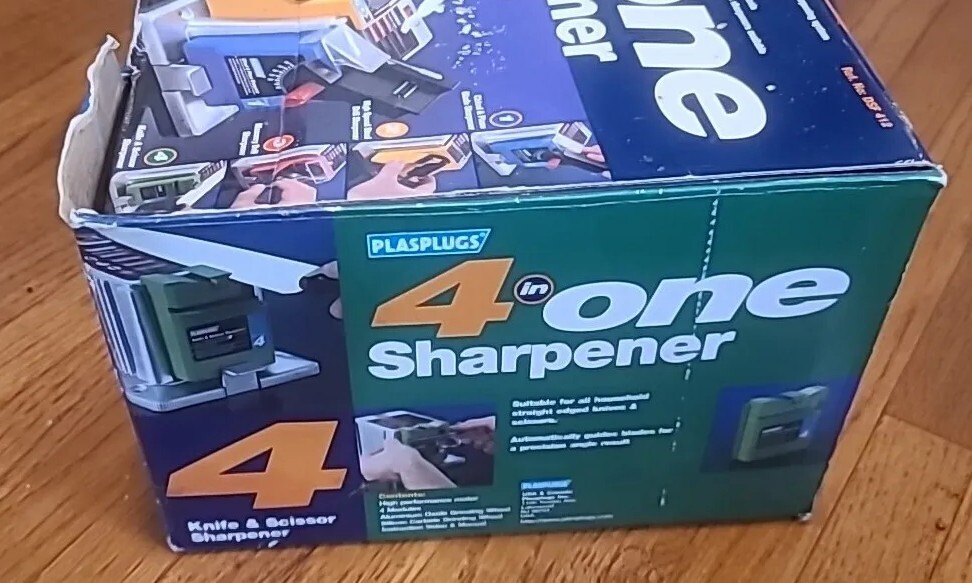 New Open Box PlasPlugs 4 in One Sharpener Knife, Scissor, Drill Bit, Chisel