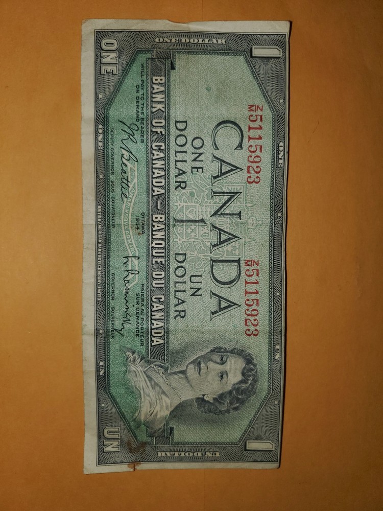 Banque Du Canada  1954 Devil's Face Dollar XF+ Edge Printing Error / Off-Center