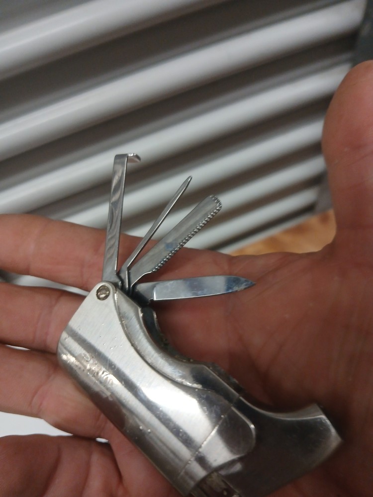 Mr. Blog 5 Function Lighter Multitool.... Refillable