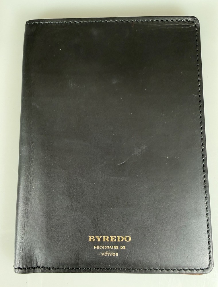 New BYREDO buffed BLACK LEATHER PASSPORT CASE. Retail: $295