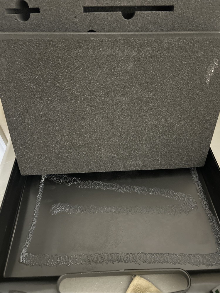 Plastic portable storage or tool box with red snap locks