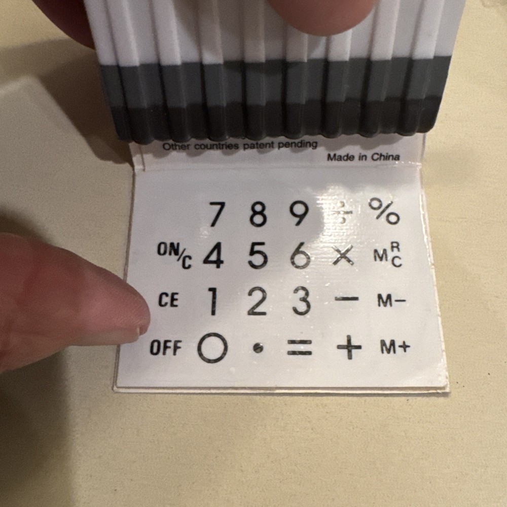 Neiman Marcus Calculator Shaped like Matchbook - silver, does not work