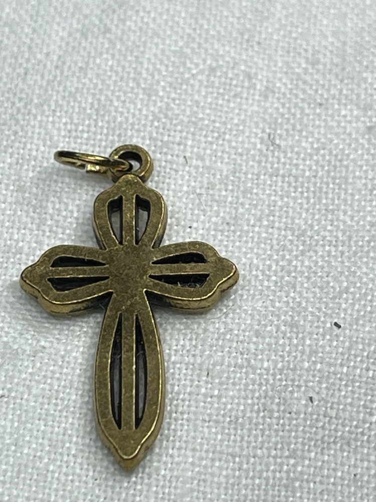 Gold/ Brass Tone Cross With Clear Stone