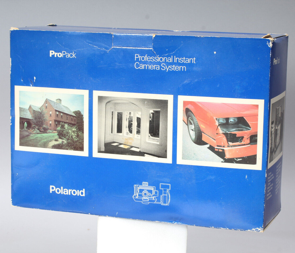 POLAROID PRO-PACK IN THE BOX W CAMERA FLASH STRAP & MANUALS FLASH BAD