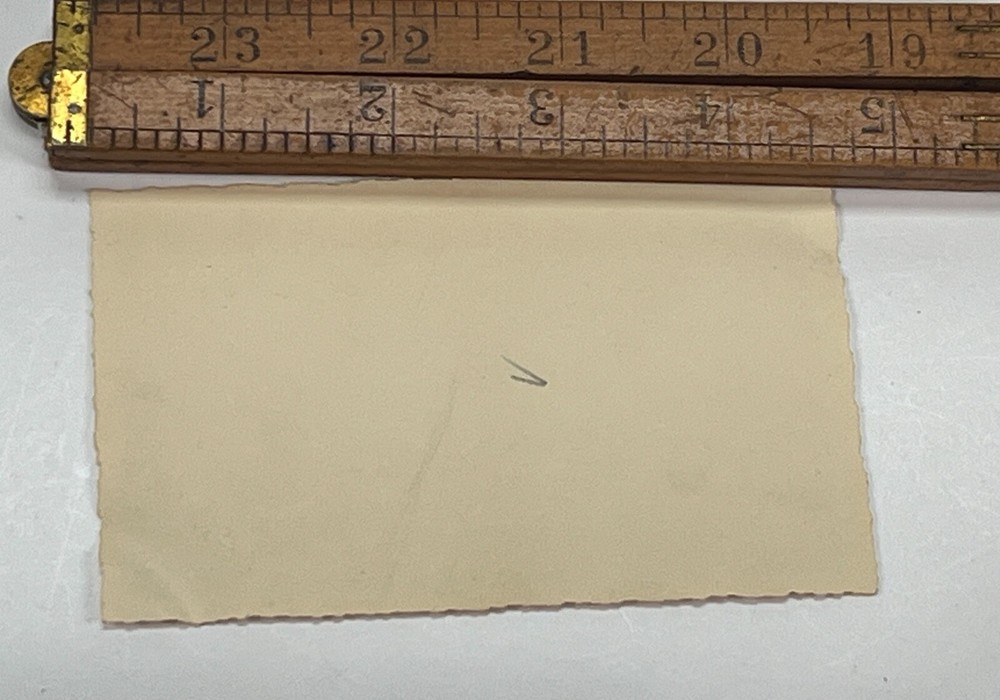 WW2 Era U.S. Construction Engineer In Between Buildings