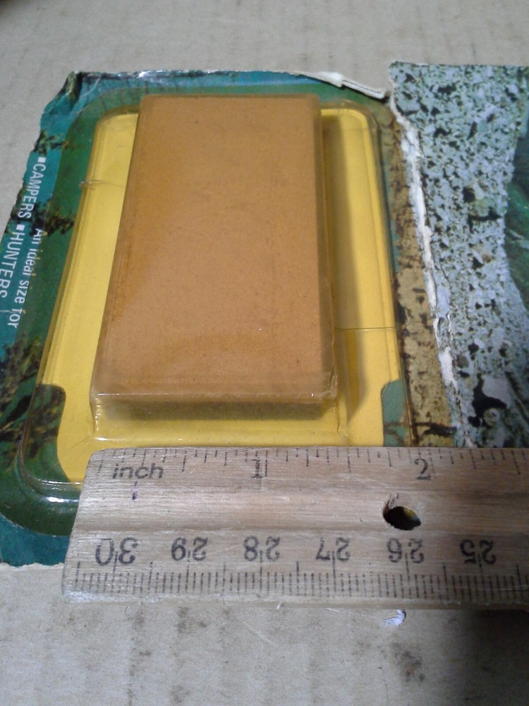 Coghlan's No.7945 Sharpening Stone w/Plastic Case. NOS-Damaged Packaging