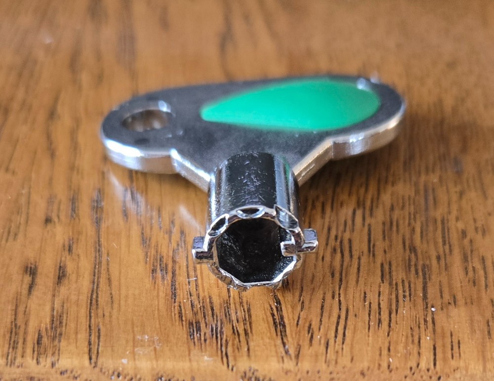 Pachislo slot machine door key with the code A102