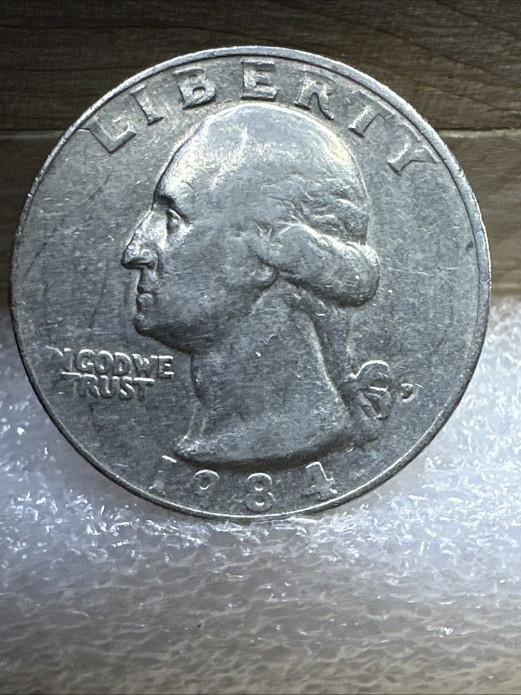 1984 P Quarter Reverse Major Grease Strike Through Error, Slightly Tilted