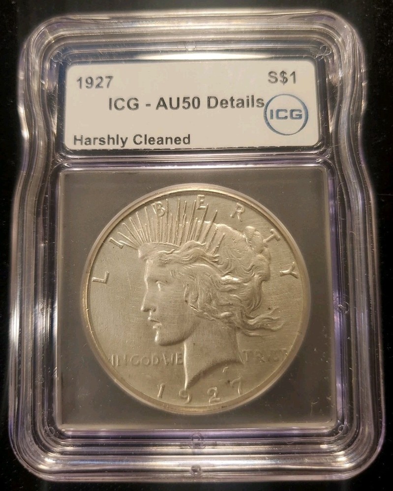 1927 P Peace Silver Dollar ICG AU50 Cleaned.  Nice Looking Coin.