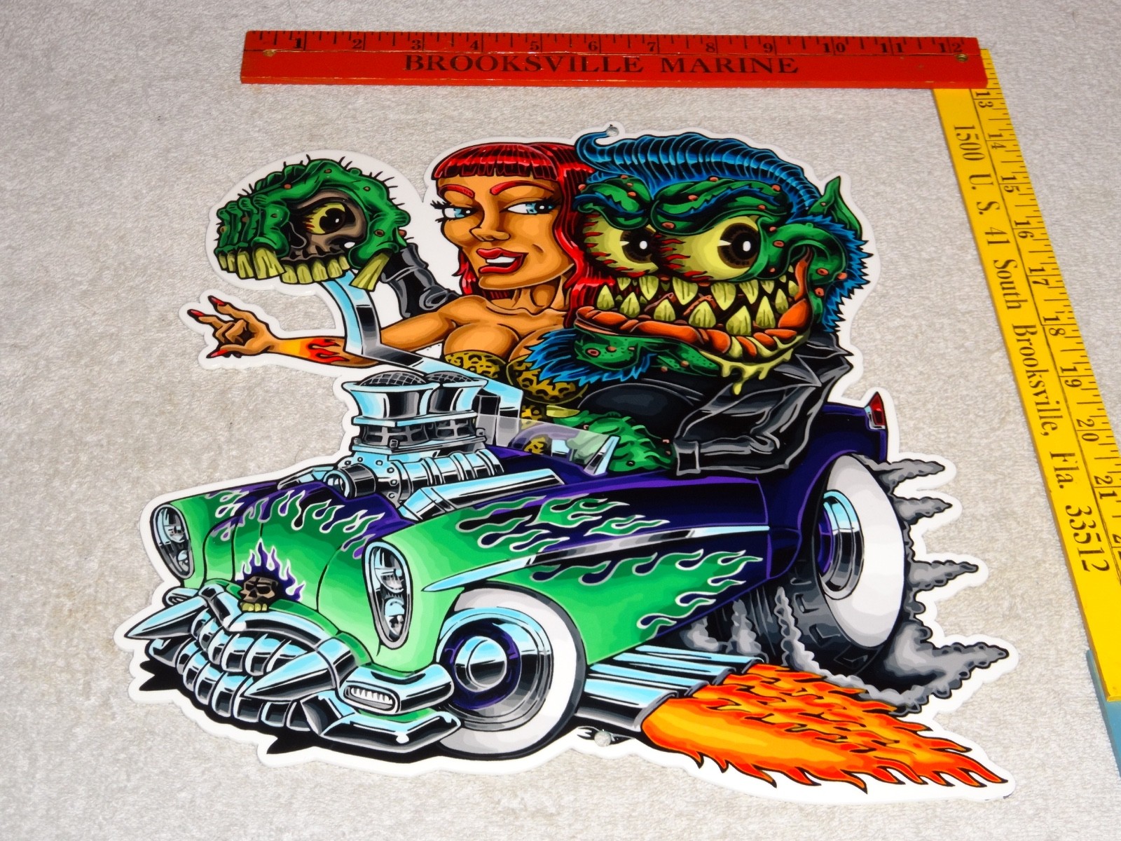 VINTAGE RATFINK DRIVES CAR W/ WOMAN MONSTER 12" METAL GASOLINE OIL RAT FINK SIGN