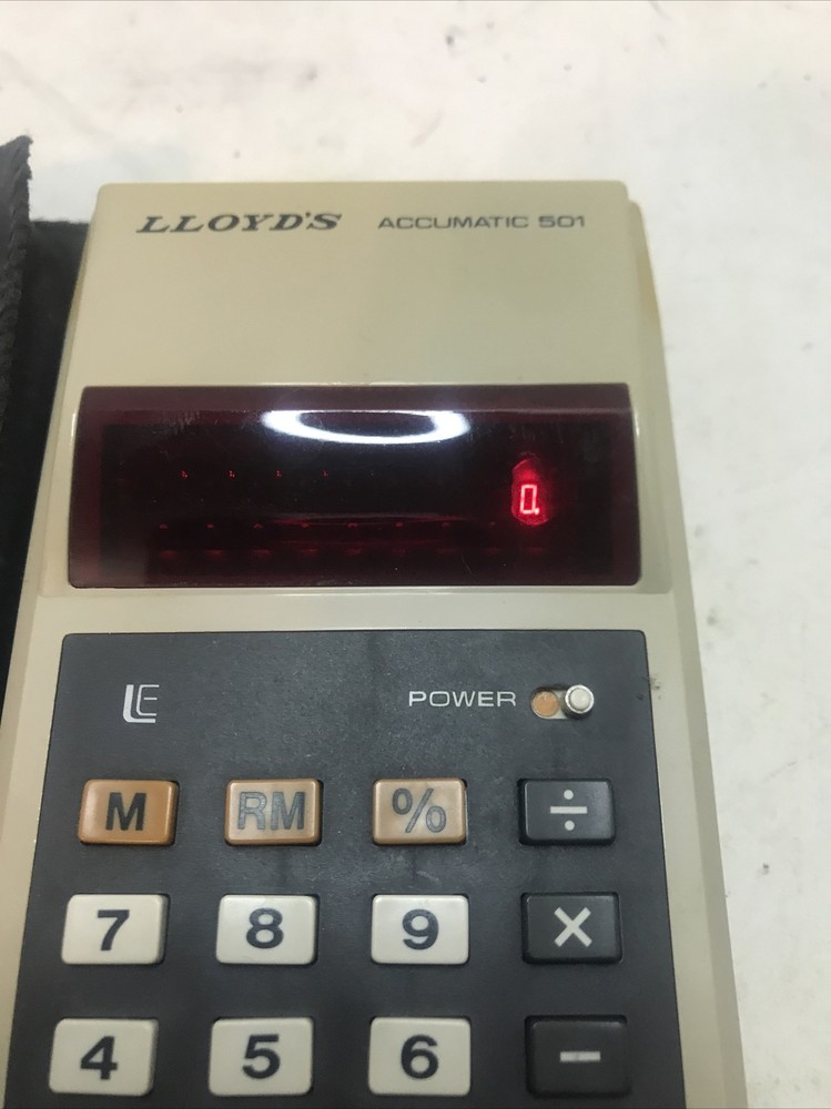 Vintage Lloyd's Accumatic E501 Microelectronic Handheld Calculator Works