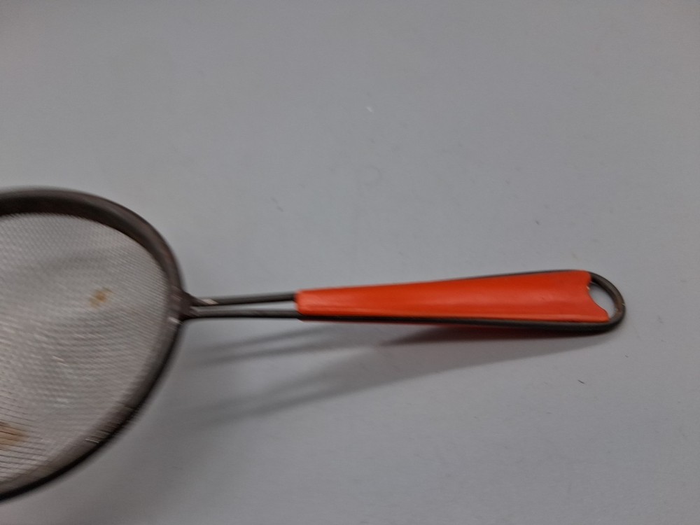 MCM Orange Vintage Bakelite Strainer