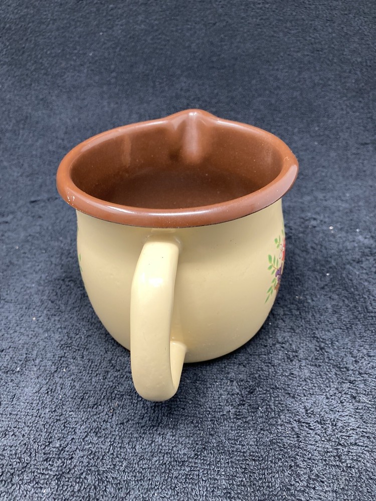 FTD metal pitcher flower pot