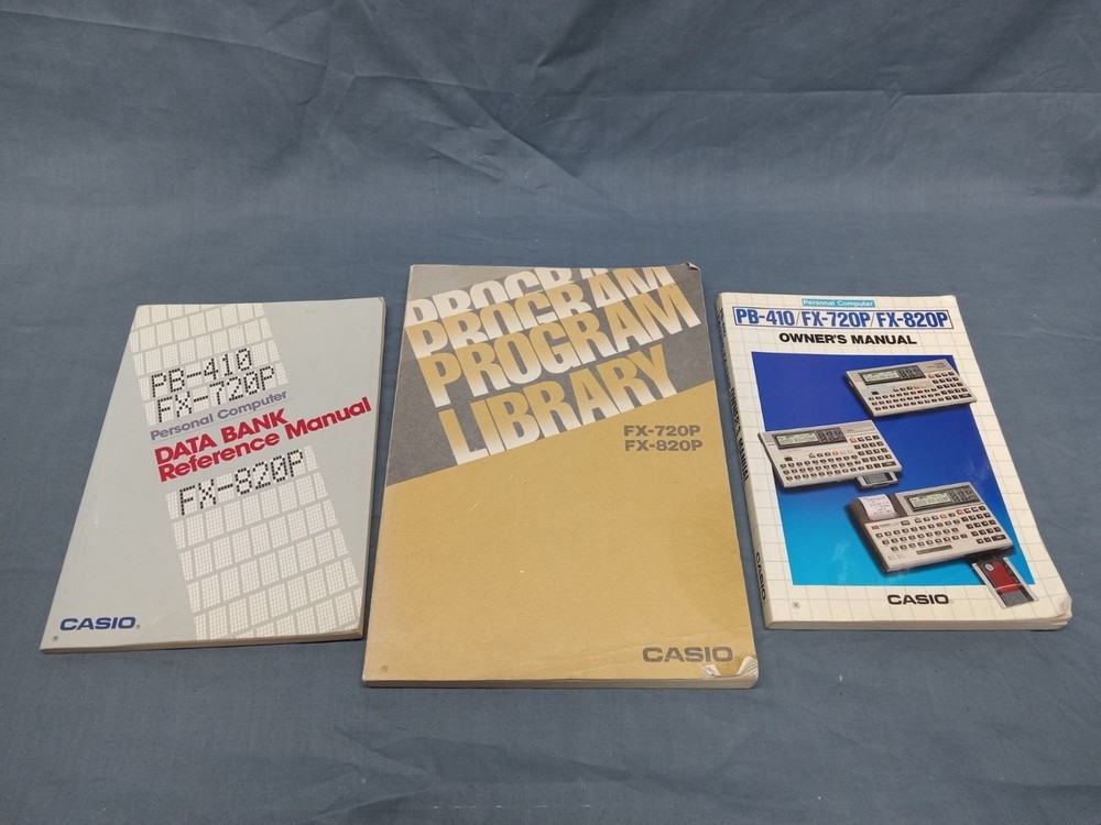 CASIO FX-820P Personal Computer With Charger Case and Manuals FULLY FUNCTIONAL!