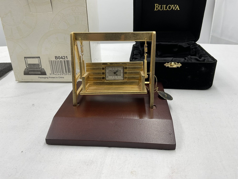Bulova B0421 Swing Clock With Stand (original packaging)
