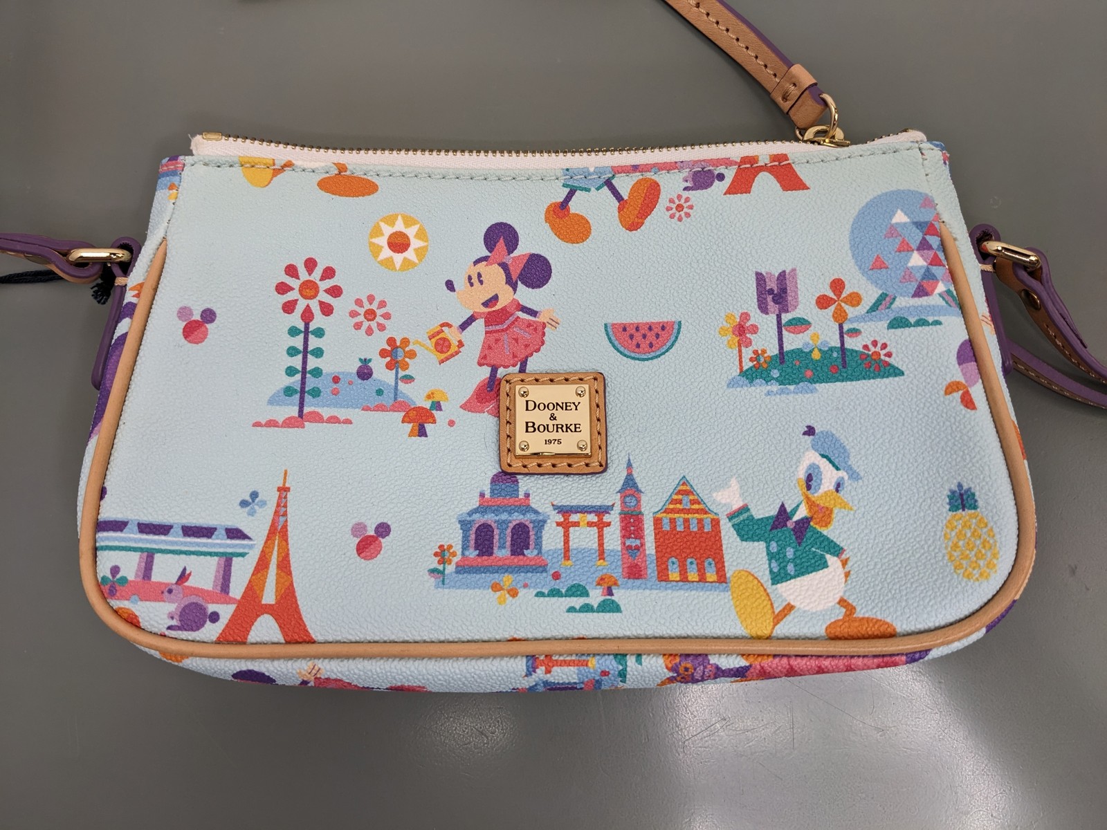 Disney Parks Dooney & Bourke Pouchette Crossbody Bag Epcot Flower Garden Lt Blue