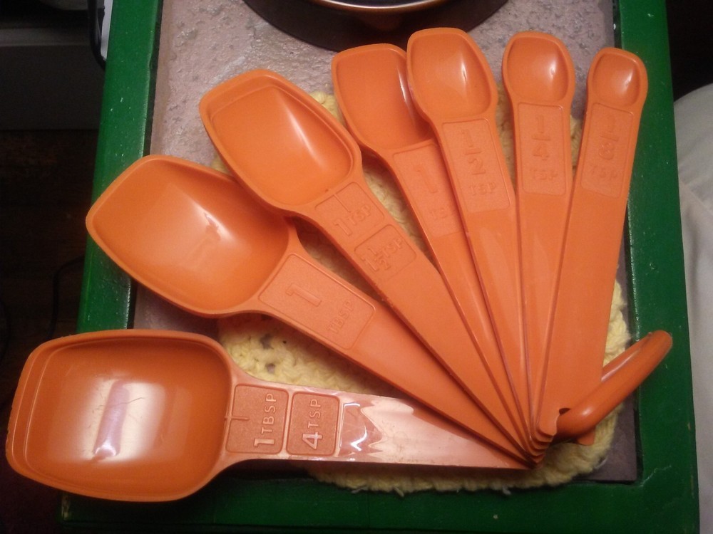 vintage Tupperware measuring spoons burnt orange