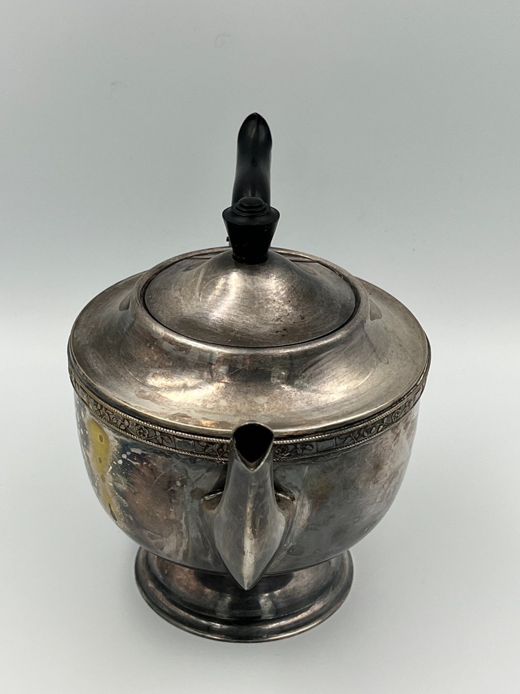 Antique silver plated teapot.