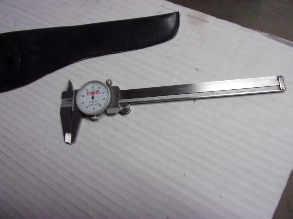 SPI   Dial Caliper  0-6"   W/Storage pouch    Shock Proof    used