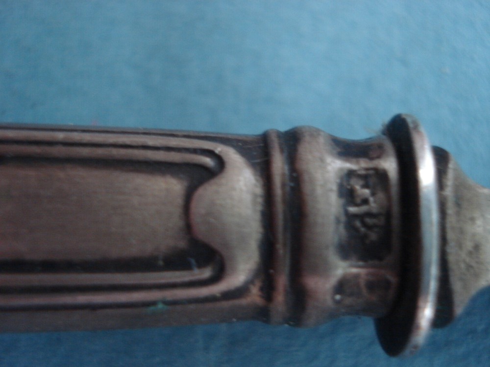 Butter knife. Silver 800 test.