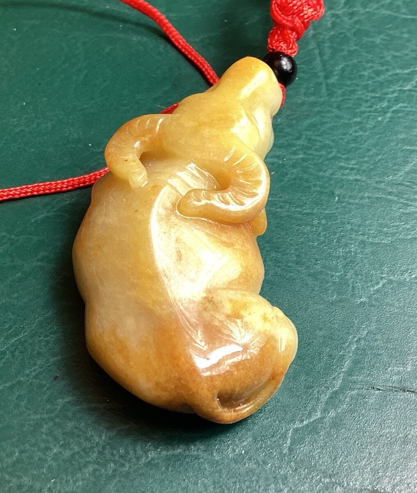 Brown 2 Sided Jadeite Ox Translucent Pendant