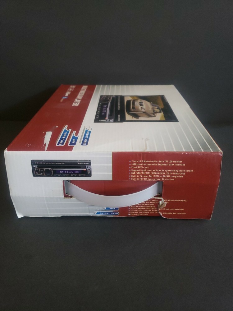 Auto multimedia player. New open box. 7" touch screen. See description