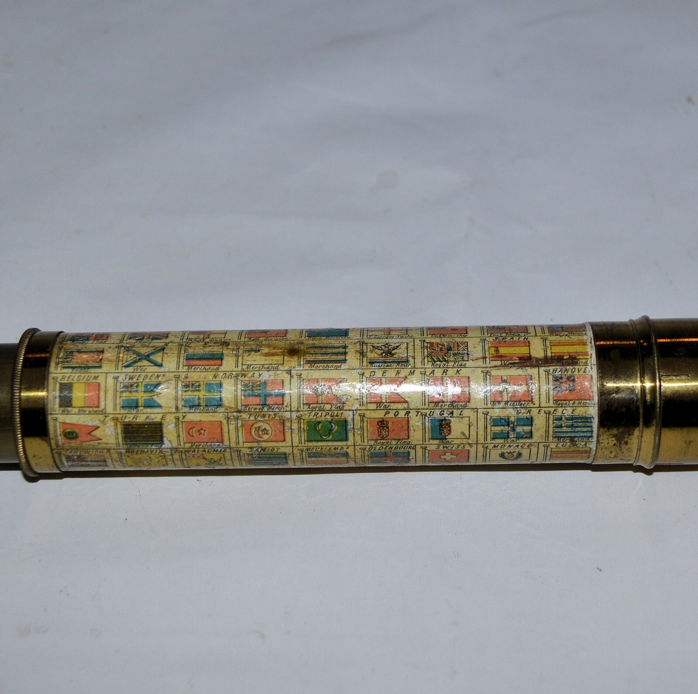 French flag panel pocket marine telescope in case.