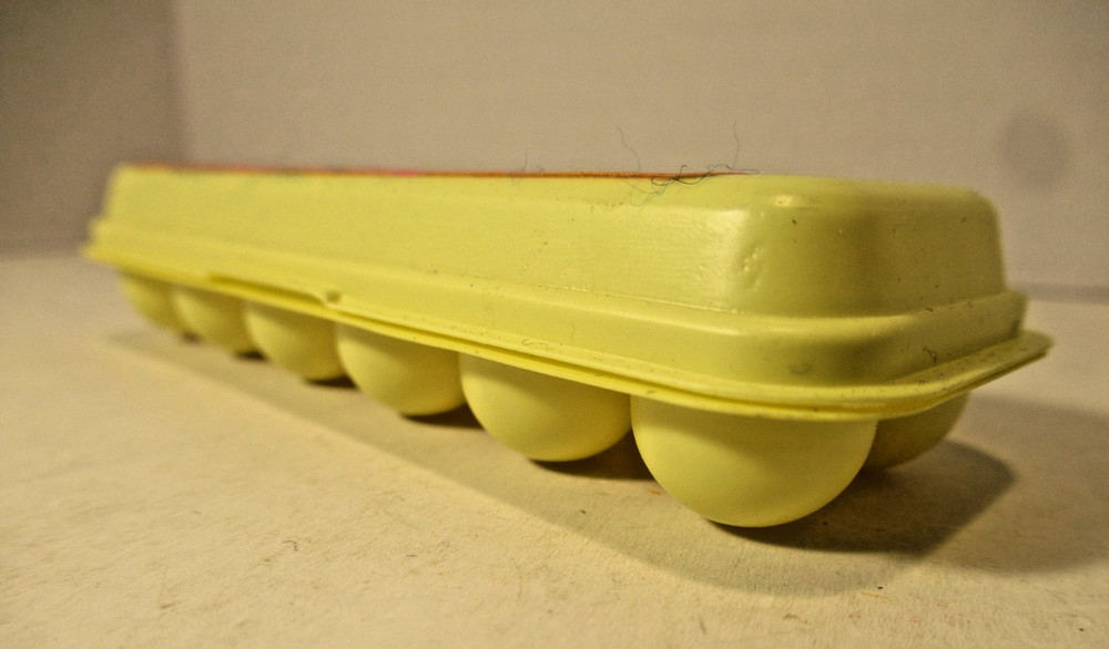 Vintage Eggums Bubble Gum Eggs Candy Container 4 inches empty package Leaf GUM