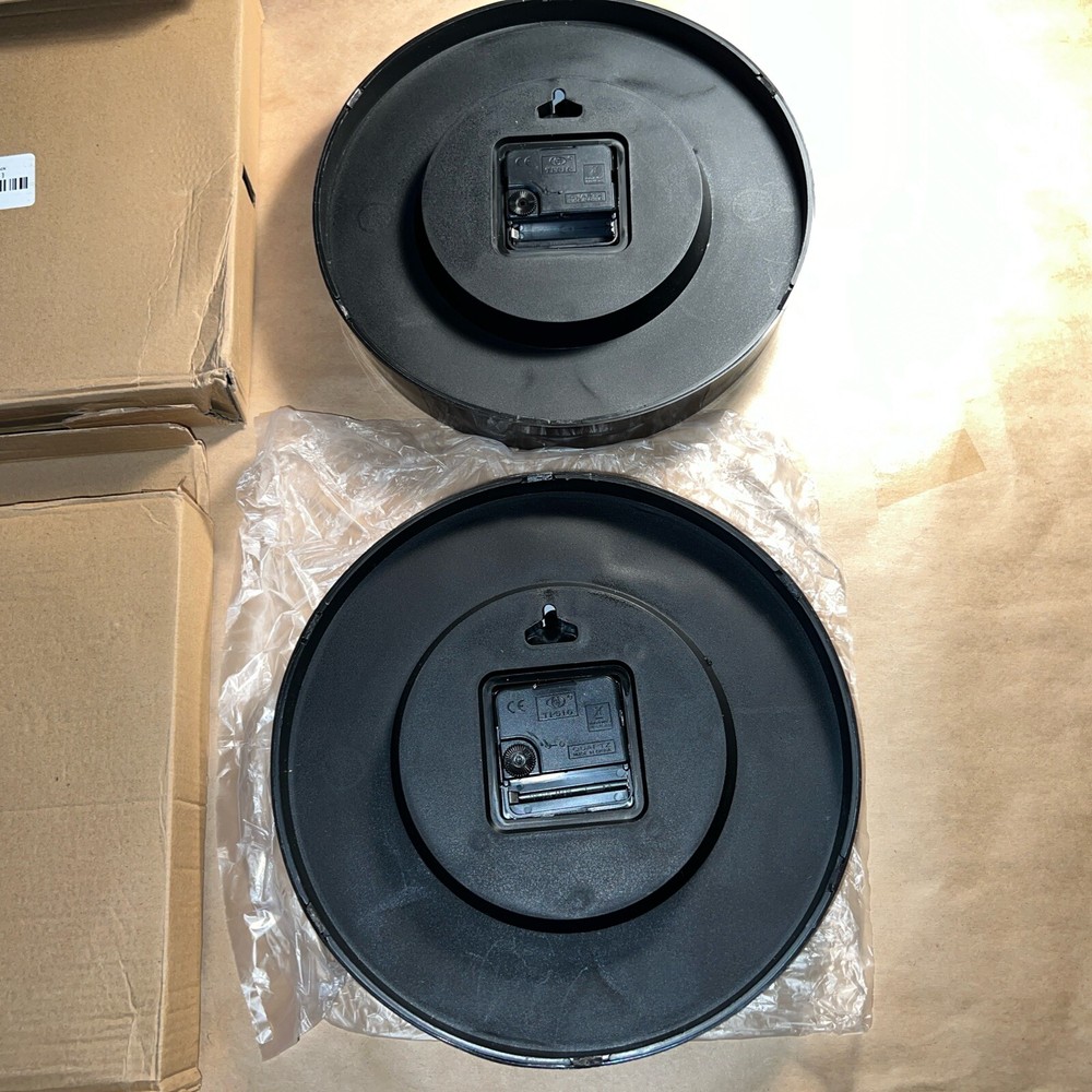 Two Smiley/Frown Wall Clocks - 9.75” Diameter