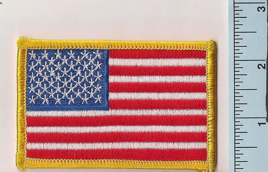 One New American Flag Patch, Embroidered, Plastic Backing, Gold Border