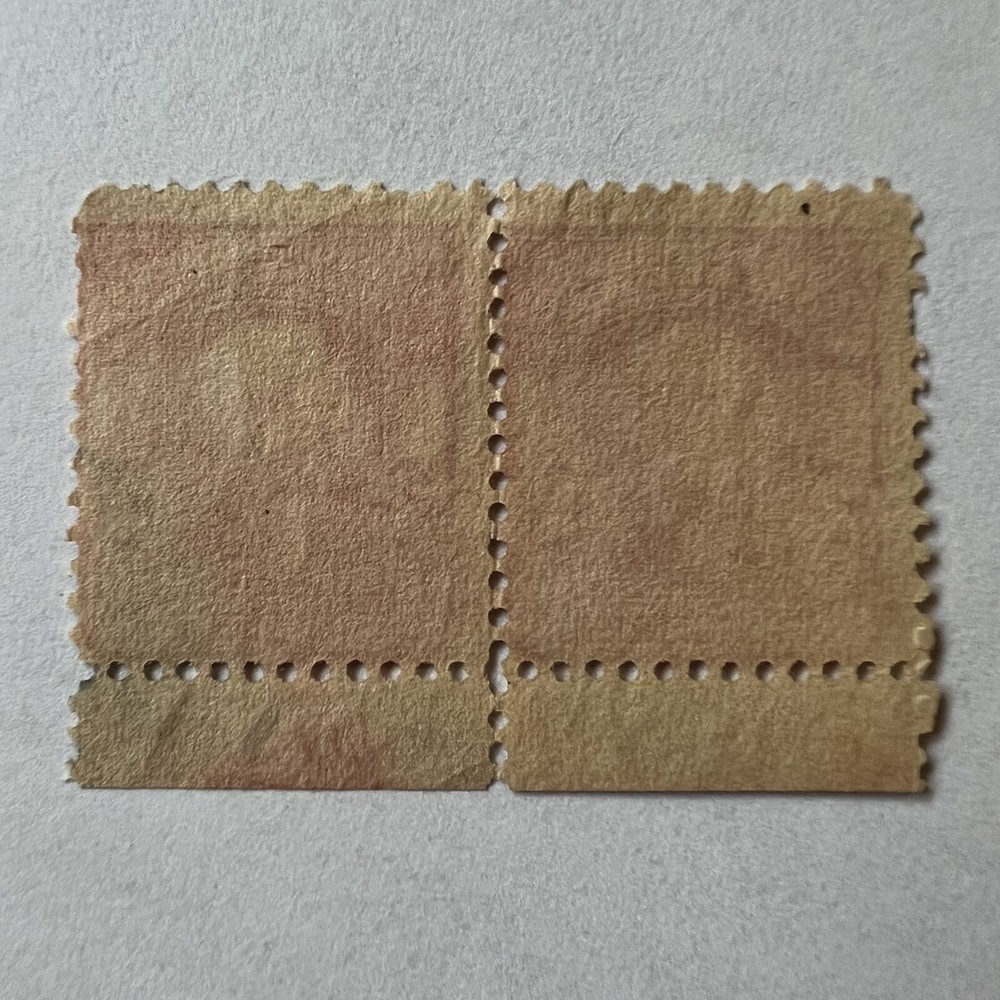 ERROR U.S. 2C STAMP PAIR WITH MISPERF AND PLATE NUMBER CUT IN HALF