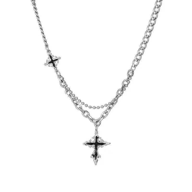 Neutral dark cross necklace