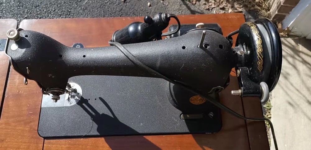 Old Singer Sewing Machine With Its Own Table