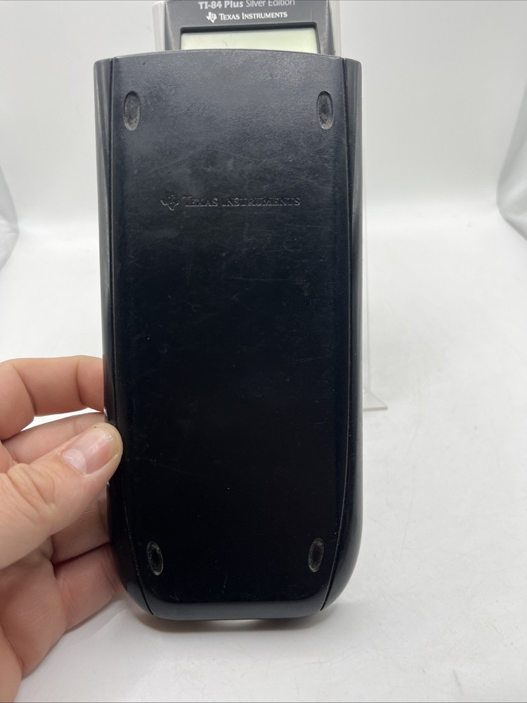 Texas Instruments TI-84 Plus Graphing Calculator - Silver Edition Works