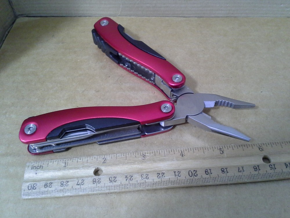 Switzerland Red Multitool Folding Pocket Pliers. VGC