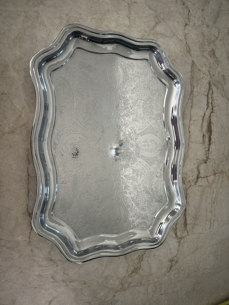 Two Chrome Plated Serving Platters, One Irvingware