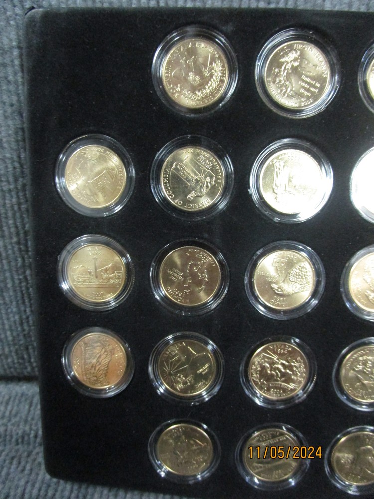 111 Uncirculated Gold State Quarters