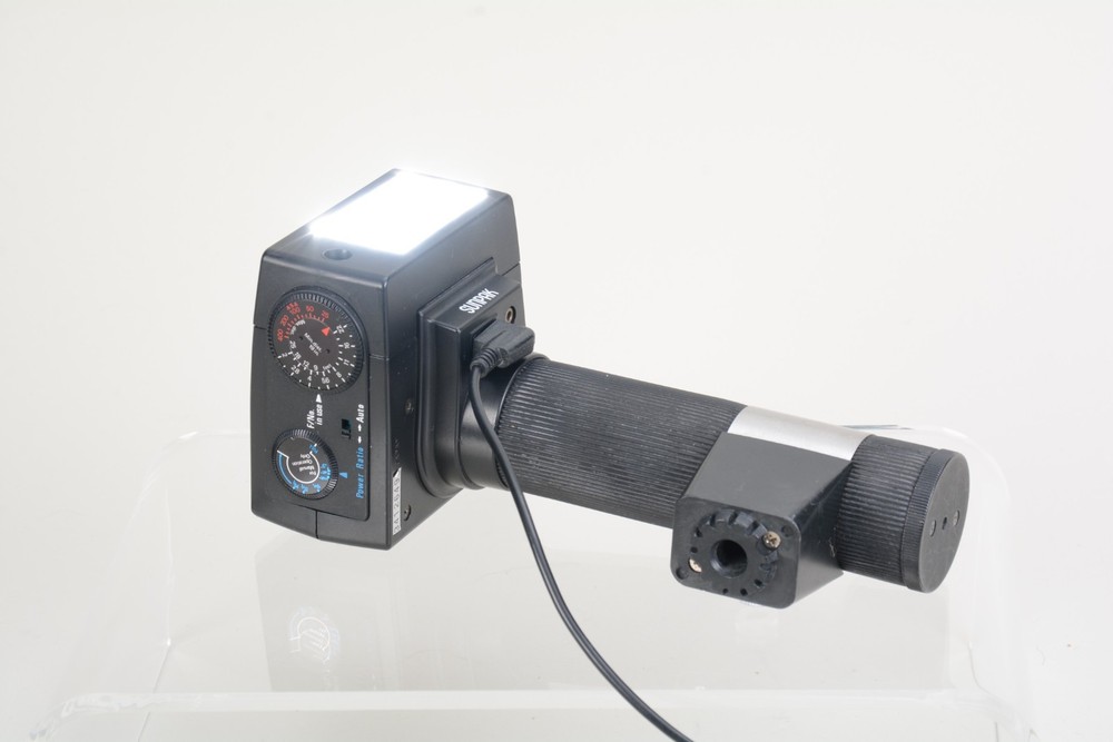 Sunpak Auto 511 Handle Mount Flash w/ Bracket. Fair condition. Tested Good 498
