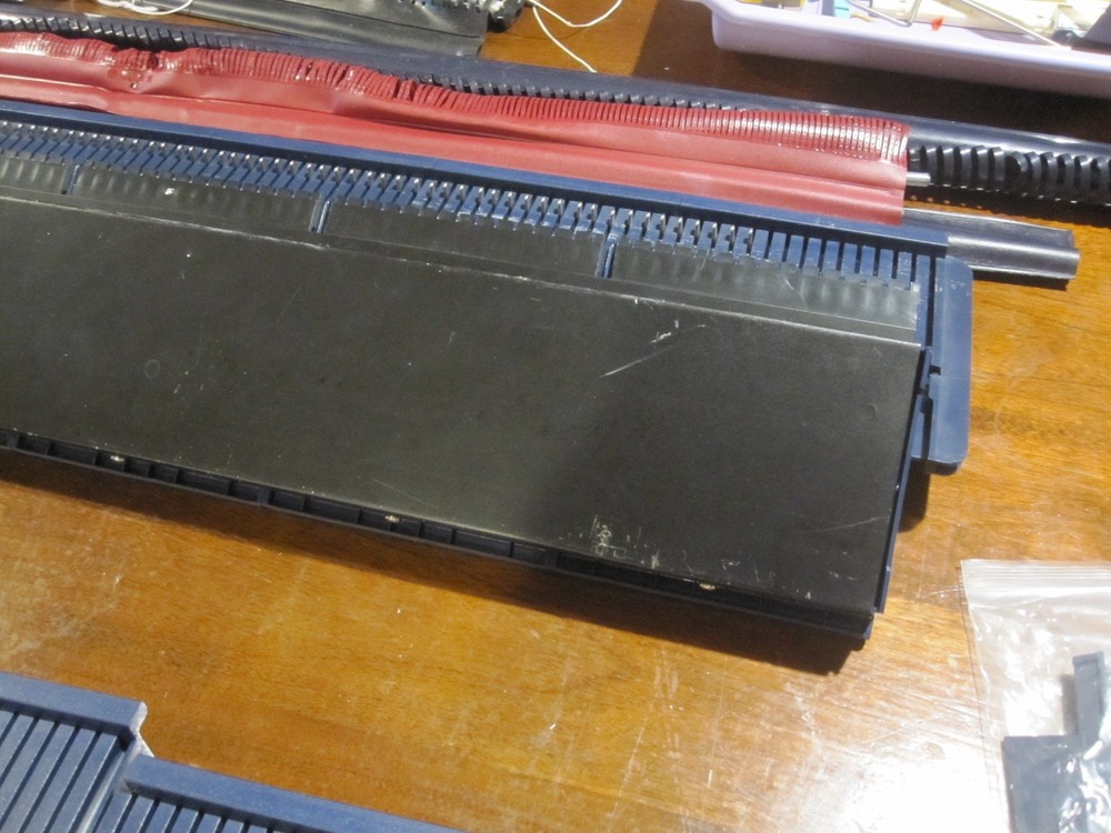 Bond Knitting Machine Two Beds Plus Extensions, Cast on Combs, some Accessories.