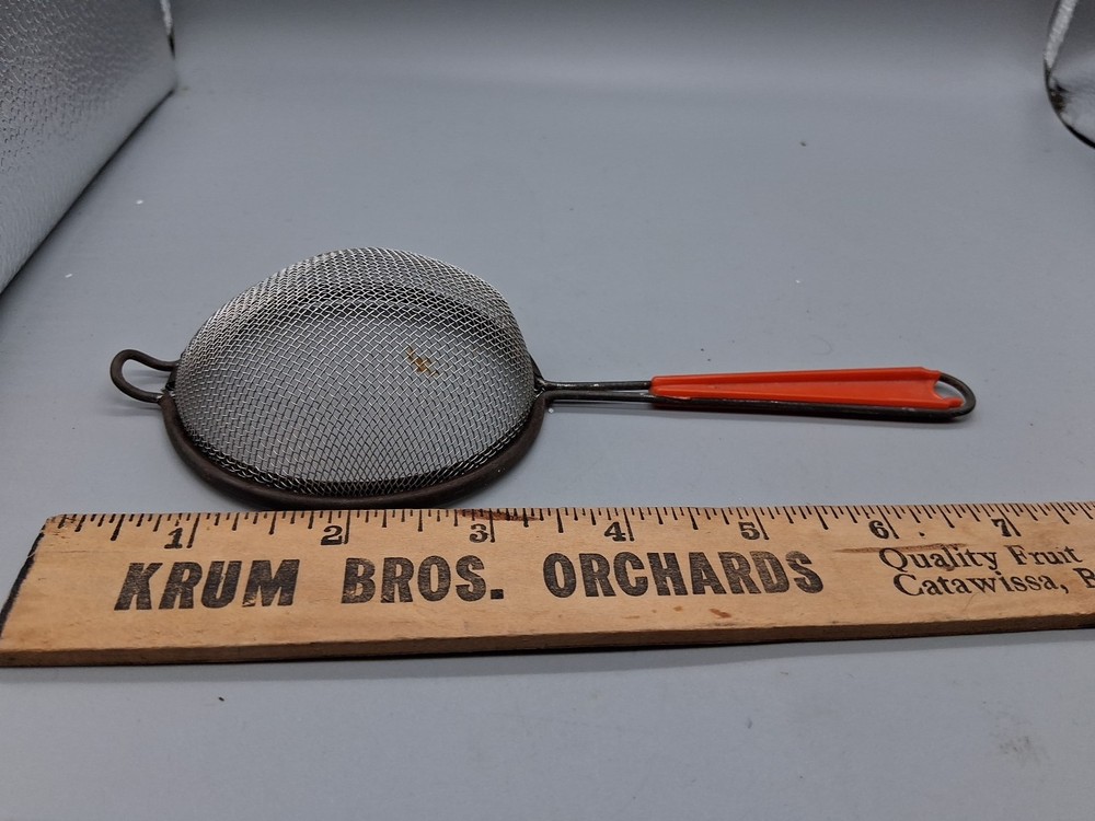 MCM Orange Vintage Bakelite Strainer