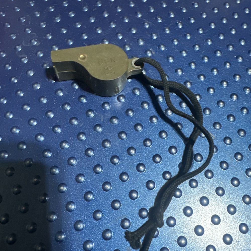 Vintage WW2 U.S. Navy 1944 dated OD Plastic Whistle with Black Lanyard Works